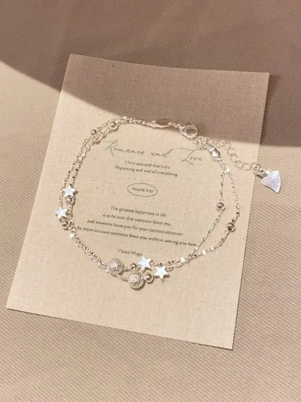 Dainty double strand star bracelet